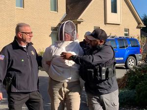 Supporting image for story: US woman accused of assault for releasing swarm of bees at officers