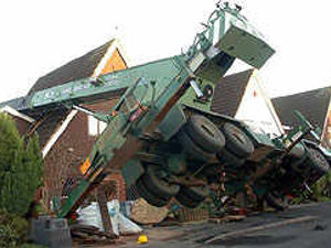 Supporting image for story: House hit by monster crane