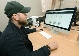 Ross Burke viewing the product range at CBD Virtue