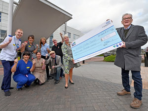 Supporting image for story: Black Country busking duo raise £11k for hospital unit 