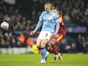 Supporting image for story: Erling Haaland ends drought as Man City sneak through in Champions League