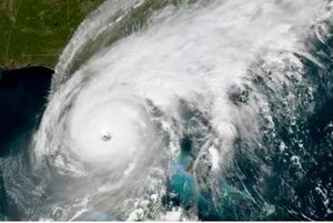 This GOES-East GeoColor satellite image taken at 12.01am EDT on Wednesday and provided by the National Oceanic and Atmospheric Administration, shows the eye of Hurricane Ian approaching the south-west coast of Florida (NOAA via AP)