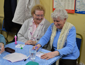 Elderly people play bingo at the Sons of Rest club in Darlaston