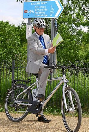 Mark Andrews on the bike planning his route along Silkin Way
