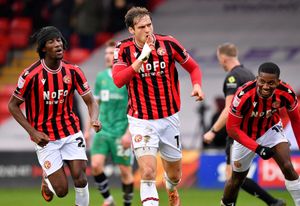 Aaron Pressley celebrates after scoring the opener goal for Walsall.