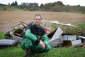 Chris Inett takes a look at rubbish dumped next to his land