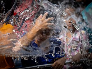 Supporting image for story: Quake recovery subdues water festival celebrations in Myanmar