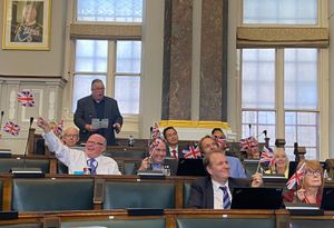 Birmingham Conservative councillors wave flags during a full council meeting on Tuesday, September 16. Credit: Alexander Brock. Permission for use for all LDRS partners.