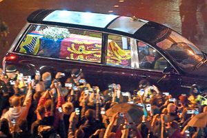 Huge crowds look on as the hearse carrying the coffin of Queen Elizabeth II passes Wellington Arch, London, on its journey back to Buckingham Palace
