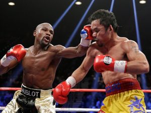 Supporting image for story: Floyd Mayweather to come out of retirement for rematch with Manny Pacquiao