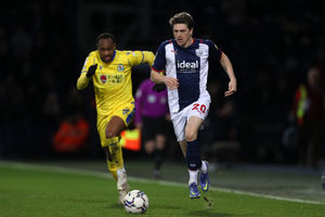 Adam Reach of West Bromwich Albion and Ryan Nyambe of Blackburn Rovers during the Sky Bet Championship match between West Bromwich Albion and Blackburn Rovers at The Hawthorns on February 14, 2022 in West Bromwich, England. (Photo by Adam Fradgley/West Bromwich Albion FC via Getty Images).