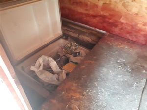 Supporting image for story: Large amount of tobacco products seized as police discover fridge hidden under a chicken coop