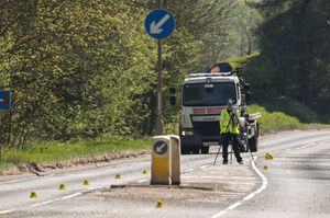 Emergency services at the scene where an ambulance worker was killed. Pic: SnapperSK