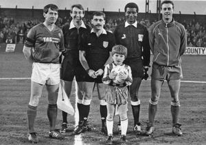 John Kyte (second left) prepares to run the line at Stockport County v Aldershot Town, April 30, 1987