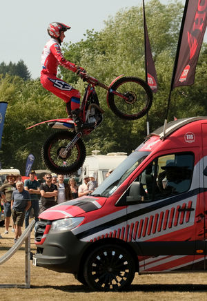 Jack Dance showing off his incredible skills as part of the Steve Colley Motorcycle stunt team. Image by Andy Compton