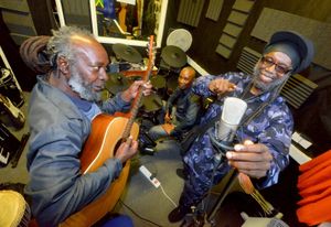Springy, Errol Melbourne (centre) and Reggae artist Macka B at the launch of Learn Music For Free