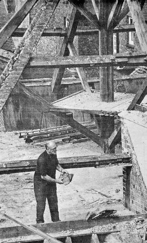 August 1973. The dismantling of the roof of Bridgnorth cockpit, which became a theatre later. The caption was 'Mr Henry Hodgson (chairman of Bridgnorth Civic Society) removing tiles.' The story began: 'The old Bridgnorth cockpit theatre's unique roof has been dismantled tile by tile ready for preservation at a new site. Members of the town's civic society have been removing the tiles and now only the main roof beams remain to be taken away. They will go in the next few days. On Saturday a crane will be brought in to remove the beam framework. No new home has been found for the theatre which is believed to have been built more than 200 years ago and was once used for cockfighting. The building in Whitburn Street has not been used as a theatre for at least 100 years. It has to be removed to make way for a car park on the site... Apart from the roof structure nothing else is being saved from the theatre which will be completely demolished in the near future.' The roof found a new home at the Avoncroft Museum of Buildings.