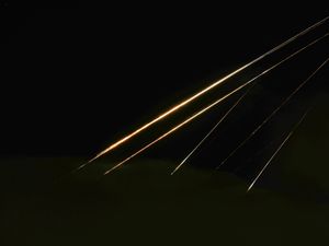 Supporting image for story: Israeli military says latest missiles from Iran incoming as explosions heard