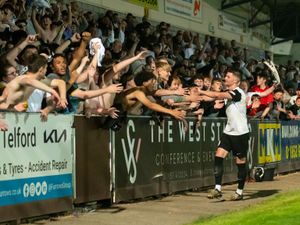 Jordan Piggott with Telford fans celebrating a 3-2 win over Halesowen to take them to the play-off final v Kettering Town (Kieren Griffin Photography)
