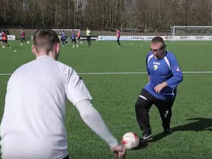 Supporting image for story: Watch: TNS owner Mike Harris signs himself