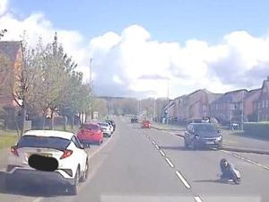 Supporting image for story: Warning for parents after police obtain footage of crash that saw motorbike passenger flung over car
