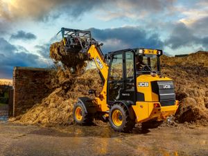 Smallest - the new JCB TM110 telescopic boom heeled loader.
