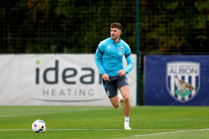 Chris Mepham in action after returning from international duty (Photo by Adam Fradgley/West Bromwich Albion FC via Getty Images)