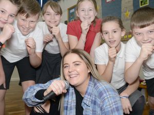 Supporting image for story: X Factor contestant Georgia shows Shropshire pupils she's a class act