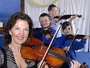 Supporting image for story: Tasmin tunes up for musical school visit
