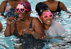 Members of the Health Equity Alliance #BBM, who are on a mission to get more black women to take up swimming and also have regular breast screening. The initiative is taking place at Sandwell Aquatics Centre.