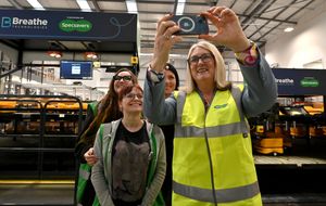 Minister for Skills Jacqui Baroness Smith with apprentices at the Specsavers' factory in Kidderminster