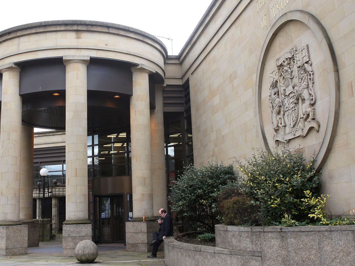 Teenager who pushed woman into path of train detained in psychiatric hospital