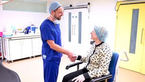 Optegra surgeon Alastair Stuart and patient Maria Walmsey