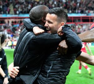 Walsall manager Mat Sadler celebrates.