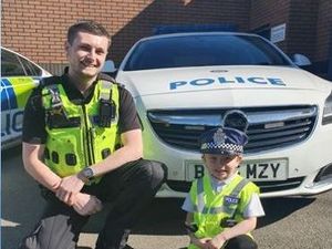 Supporting image for story: Wannabe police recruit gets tour of station to celebrate fourth birthday