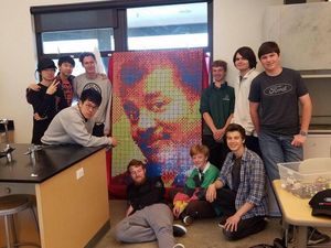 Supporting image for story: Neil deGrasse Tyson praises students’ intricate Rubik’s cube mosaic of his face