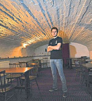 Former landlord Steve Robinson pictured in the cellar, which has been converted into another bar