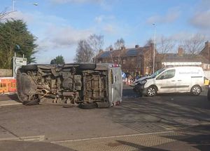 A van overturned in a crash at the junction of Wolverhampton Road West and Bentley Road North