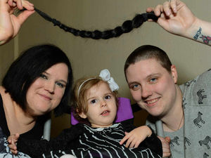 Supporting image for story: Mother cuts off hair in bid to help daughter