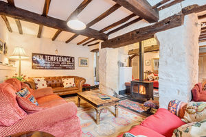 One of the attractive, beamed reception rooms.