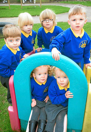 Archie Holden, Corey Holden and Finley Holden with Violet Tiernan, Tulip Tiernan and Toby Tiernan, who all started school this week