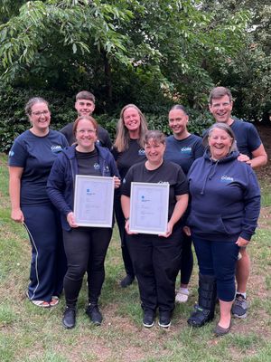 Image shows all of team CASS with their finalist certificates