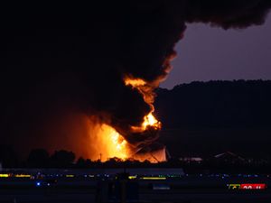 Supporting image for story: Massive fireball erupts as UPS plane crashes at airport, leaving seven dead