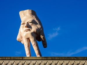 Supporting image for story: Controversial hand sculpture which towered over city to be removed