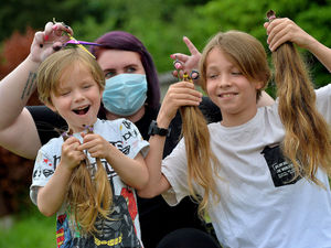 Supporting image for story: Oh brother! Kind-hearted lads get the chop for charity