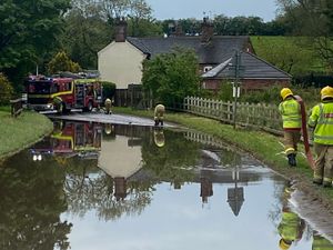 Supporting image for story: Fire crews prevent flood deluging house