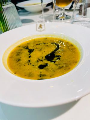 Pre-starter of White bean and spinach soup with basil at Villa Park in Birmingham