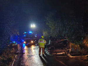 Supporting image for story: Driver escapes wreckage of car which flipped onto roof