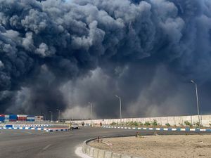 Black smoke rises in the sky after a massive explosion rocked a port near the southern port city of Bandar Abbas