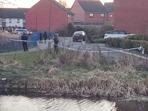 The canal is next to a children's play area
